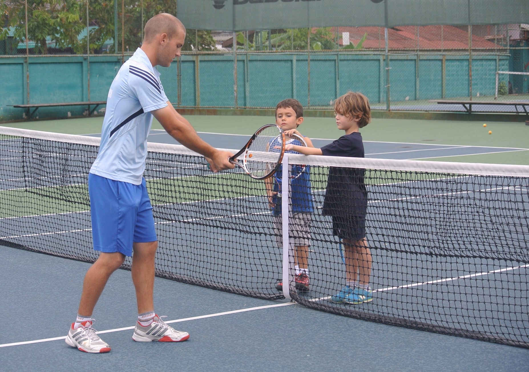 group tennis coach singapore